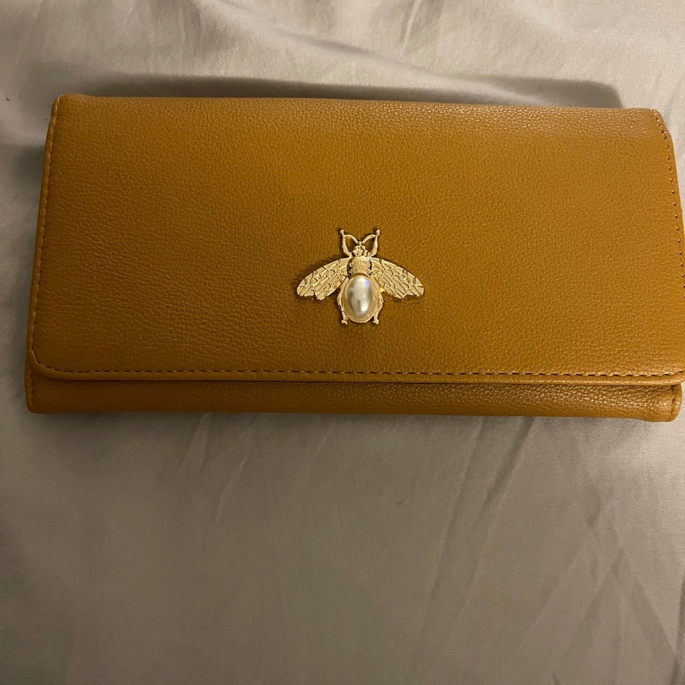 Tan/mustard wallet with bumble bee